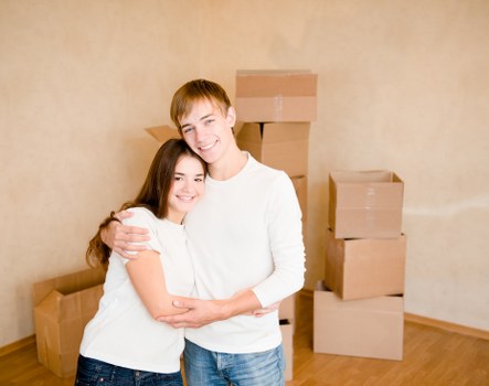Boxes and furniture prepared for a student house move in Highbury