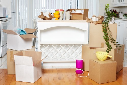 Truck hire preparation for a move in Highbury with packed boxes and furniture