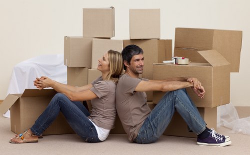 Careful handling of household items during a Highbury apartment relocation